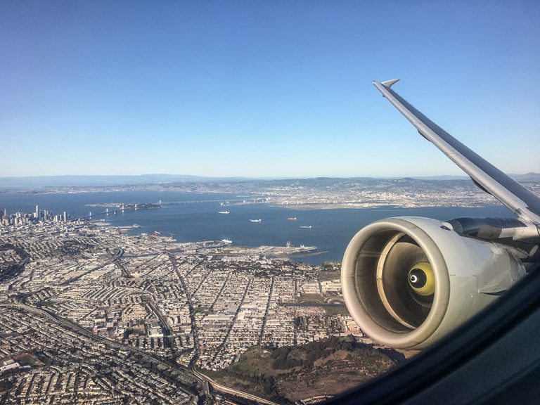 Take off over the city SFO