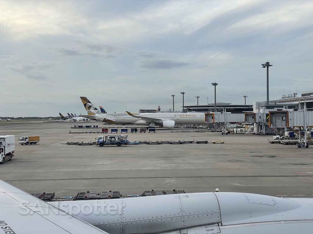 Lineup of aircraft at terminal at NRT