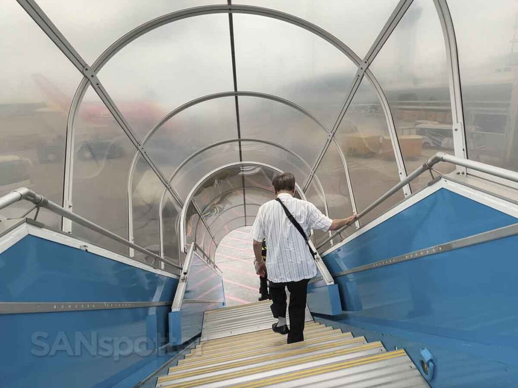 Walking down air stairs at the Ho Chi Minh City airport