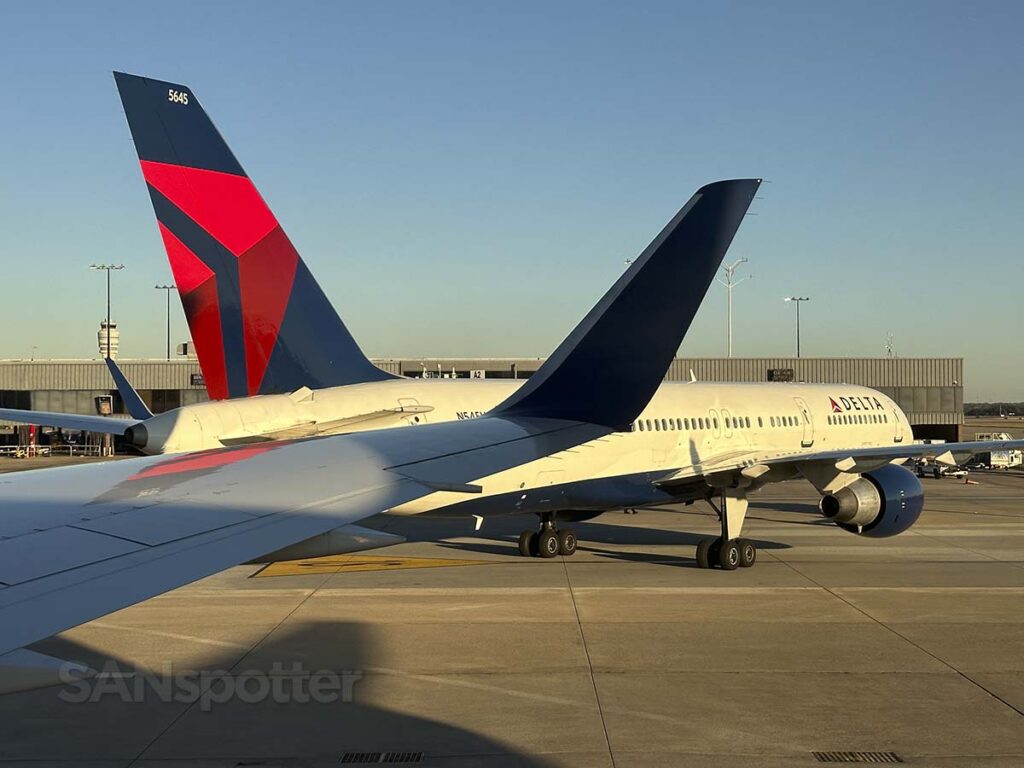 Delta 767-300 taxiing past a Delta 757-200