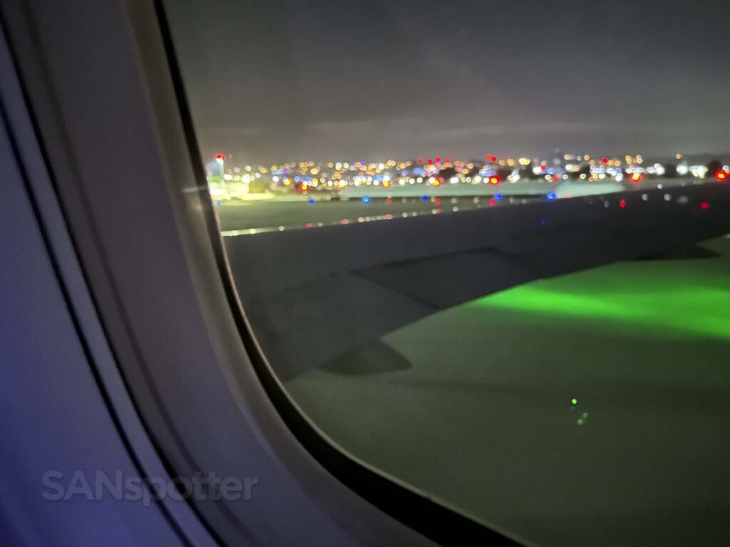 Delta 767-300 taxiing to gate at San Diego at night