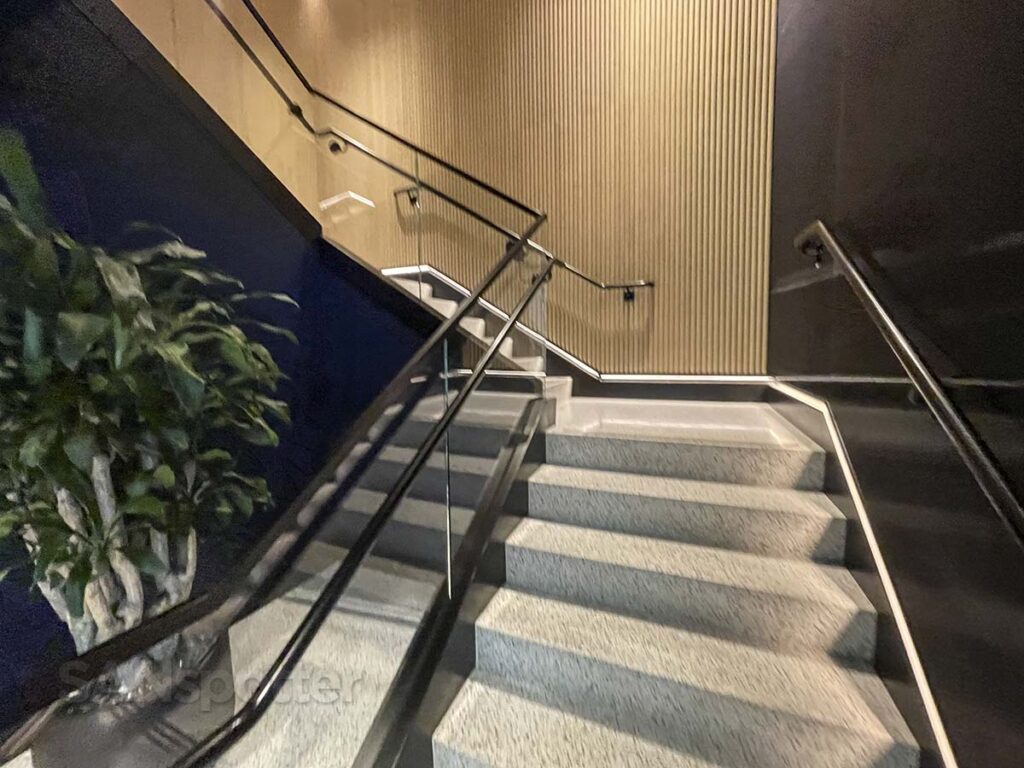 Stairs to the entrance of the chase sapphire lounge SAN