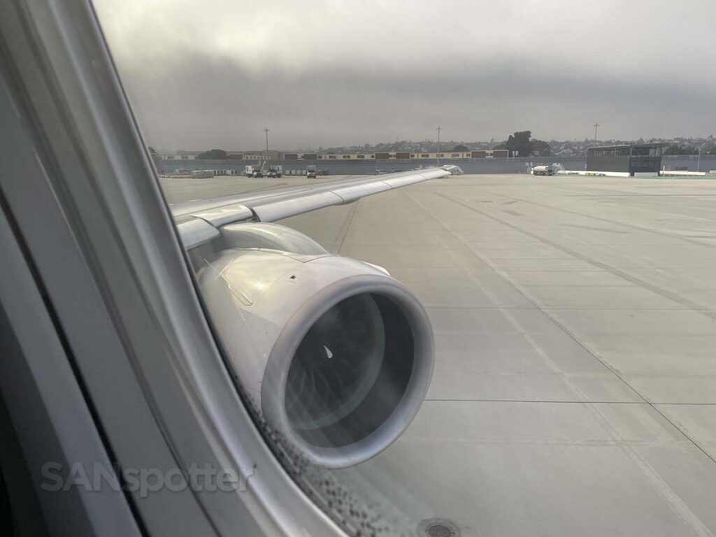 Porter Airlines E195 E2 taxiing to the runway in the fog San Diego airport