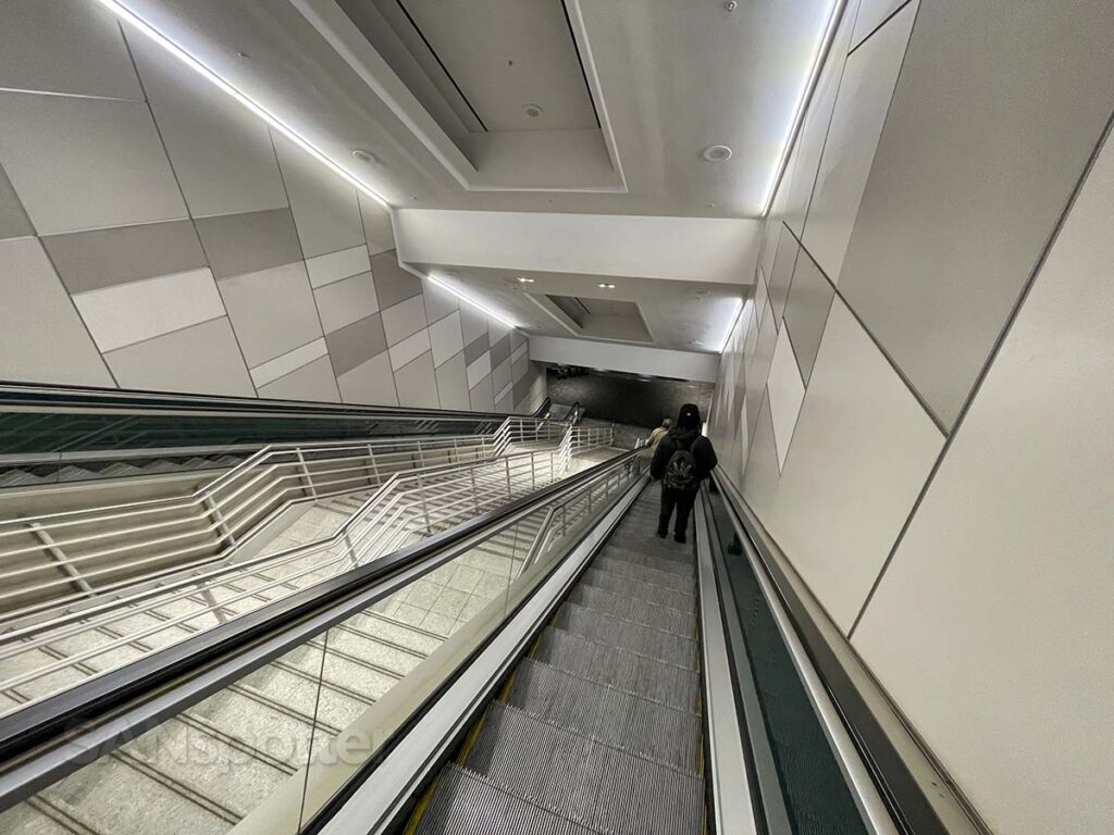 Escalators leading down to the underground walkway terminal 3 YYZ